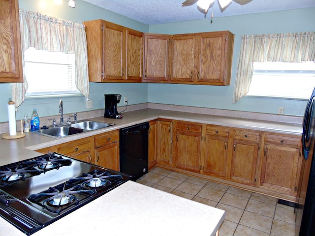 2813 Nile Rd, Chattanooga, TN 37421 - kitchen featuring ceiling fan, light countertops, black appliances, and a sink