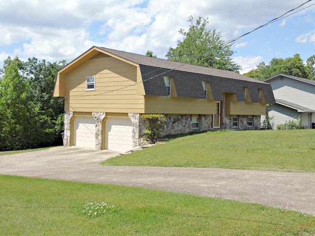 2813 Nile Rd, Chattanooga, TN 37421 - bi-level home with an attached garage, a gambrel roof, concrete driveway, a front yard, and a shingled roof