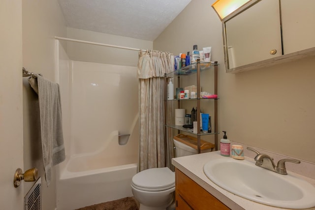 bathroom featuring a textured ceiling, shower / tub combo with curtain, vanity, and toilet