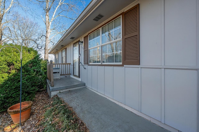 view of side of property with board and batten siding