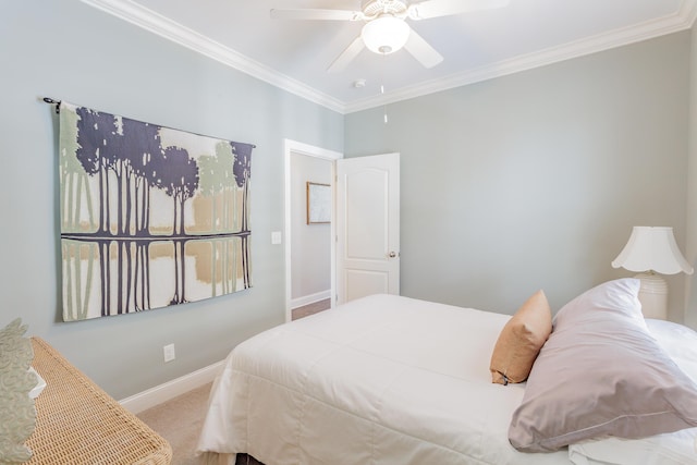 bedroom with baseboards, carpet, ornamental molding, and a ceiling fan