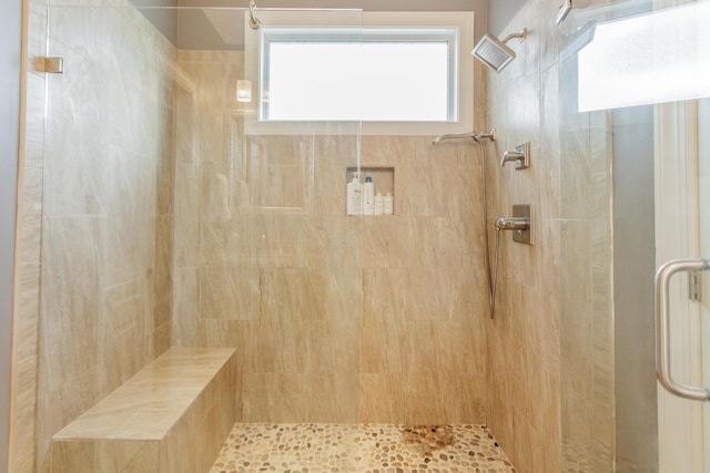 bathroom with a stall shower