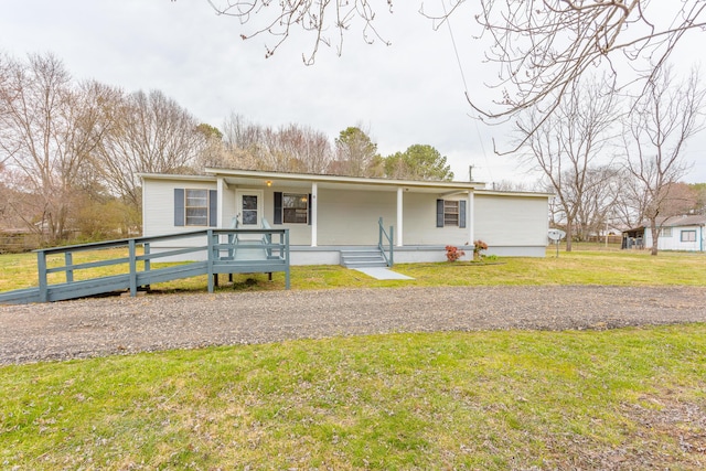 view of front of home featuring a porch and a front lawn