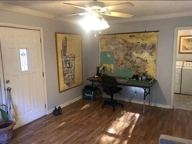 home office with washing machine and clothes dryer, ornamental molding, baseboards, and wood finished floors