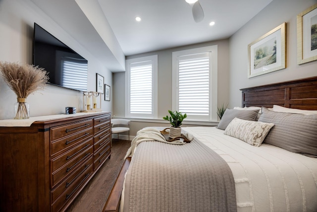 bedroom with dark wood-type flooring and recessed lighting