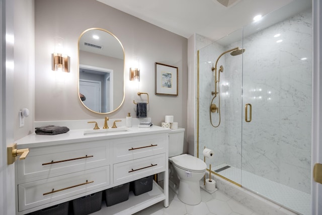 bathroom featuring vanity, toilet, visible vents, and a marble finish shower