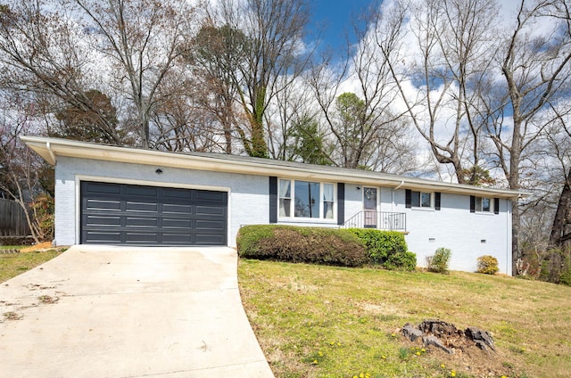 ranch-style home with brick siding, a garage, a front yard, and driveway