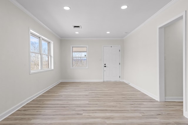 entryway with light wood finished floors, visible vents, baseboards, ornamental molding, and recessed lighting