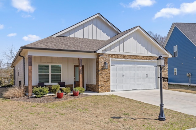 view of front of house with driveway, stone siding, board and batten siding, an attached garage, and a shingled roof