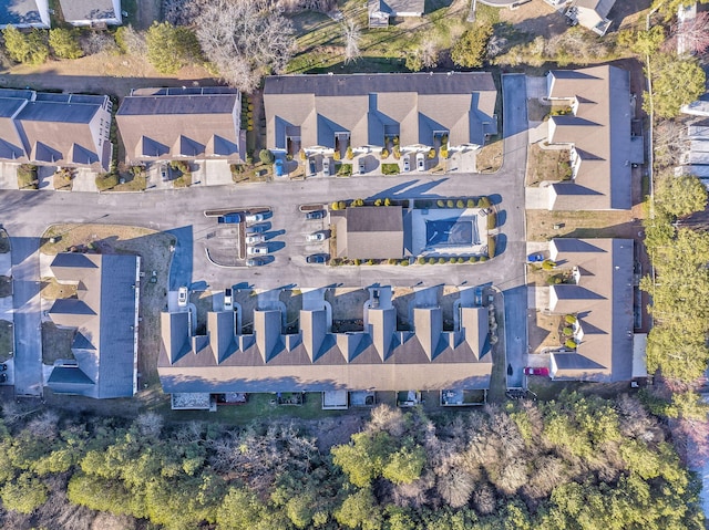 birds eye view of property with a residential view