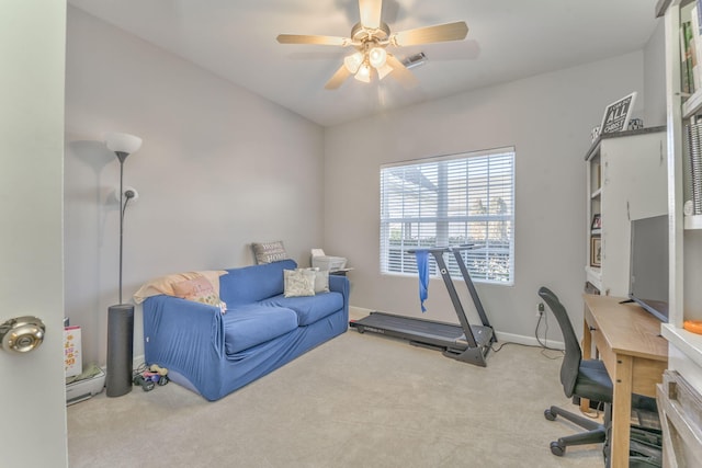 home office featuring a ceiling fan, baseboards, visible vents, and carpet floors