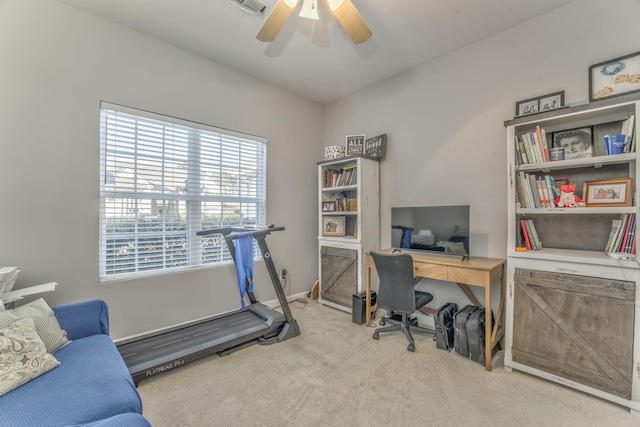 home office with baseboards, visible vents, carpet floors, and ceiling fan