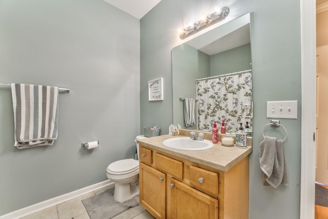 full bathroom with baseboards, toilet, a shower with curtain, tile patterned floors, and vanity