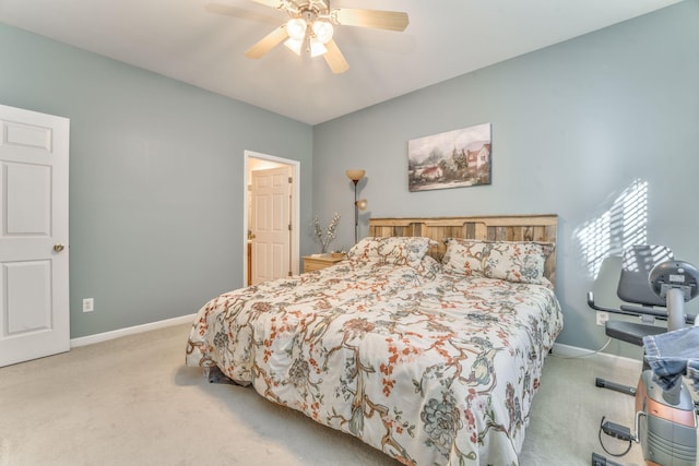 bedroom featuring baseboards, carpet floors, and a ceiling fan