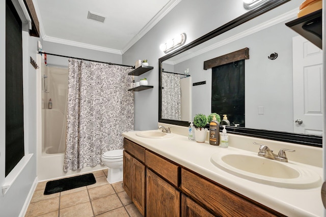 full bath with tile patterned flooring, crown molding, toilet, and a sink