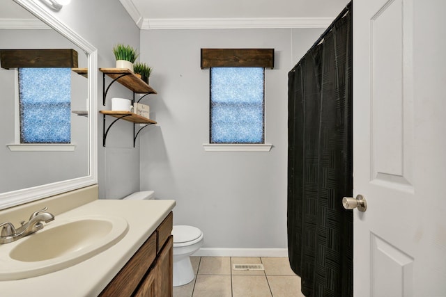 bathroom featuring vanity, baseboards, tile patterned flooring, crown molding, and toilet