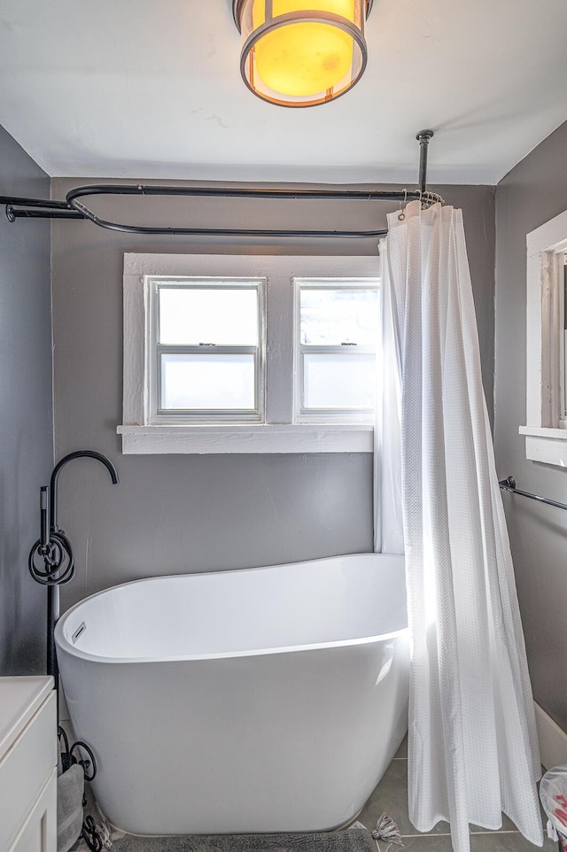 bathroom featuring a freestanding tub