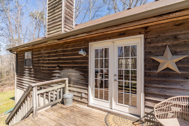 wooden deck featuring french doors