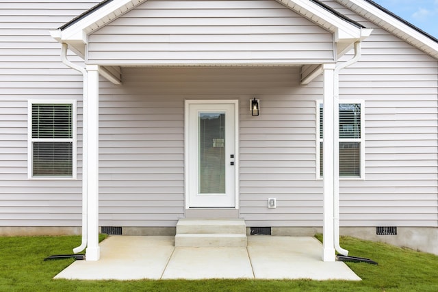 doorway to property featuring crawl space