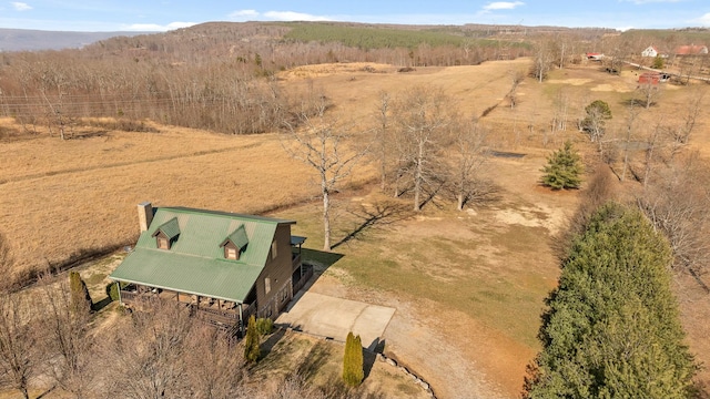 birds eye view of property with a rural view