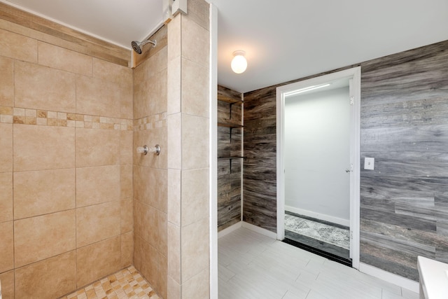 full bath with a tile shower