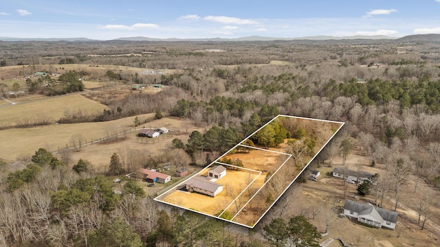 drone / aerial view with a rural view and a mountain view