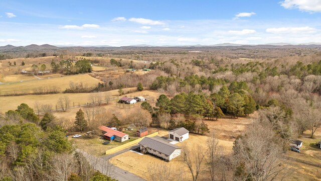 drone / aerial view featuring a rural view and a mountain view