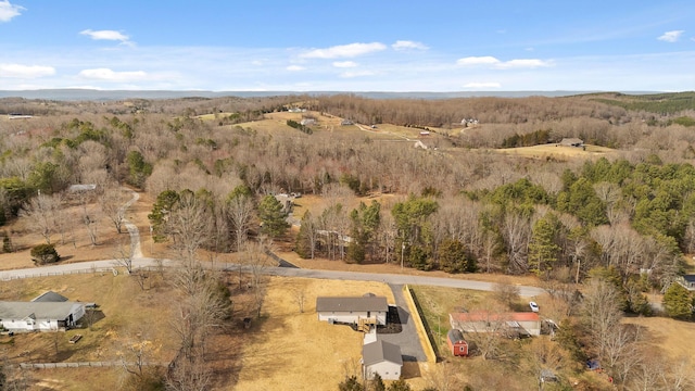 bird's eye view featuring a view of trees