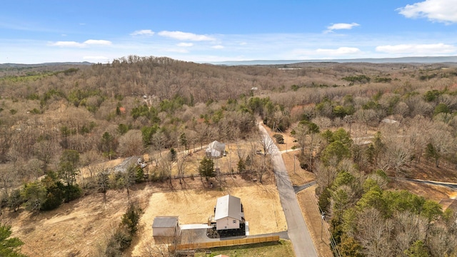 drone / aerial view with a forest view