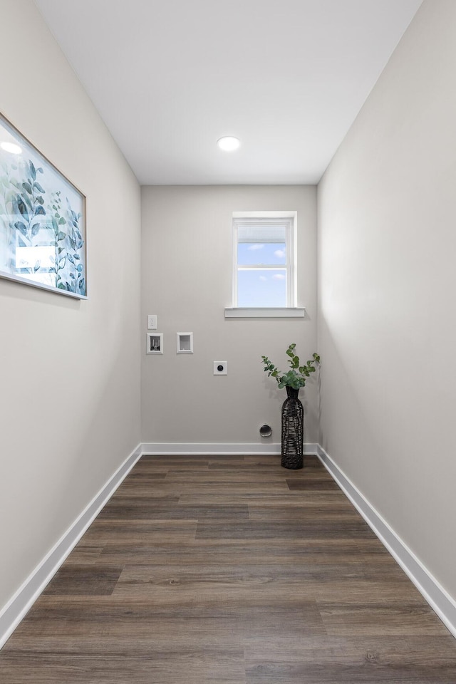 laundry room featuring baseboards, laundry area, hookup for a washing machine, dark wood-style floors, and hookup for an electric dryer