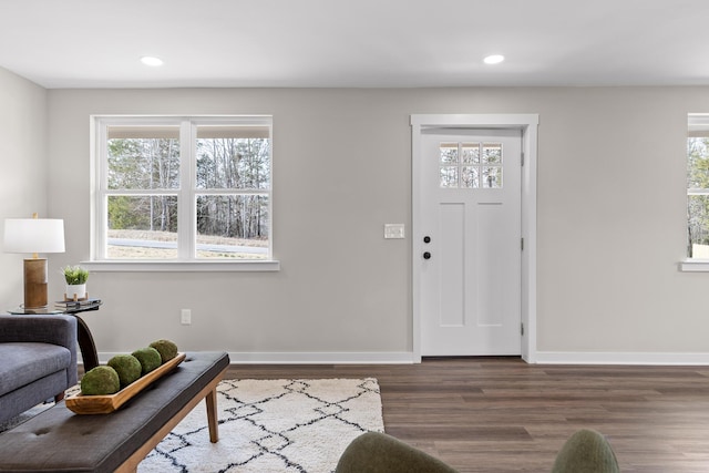 entrance foyer featuring recessed lighting, wood finished floors, and baseboards