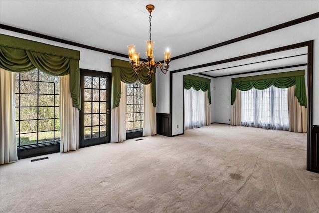 5803 Lake Resort Dr, Hixson, TN 37343 - unfurnished room featuring visible vents, carpet floors, a chandelier, and crown molding
