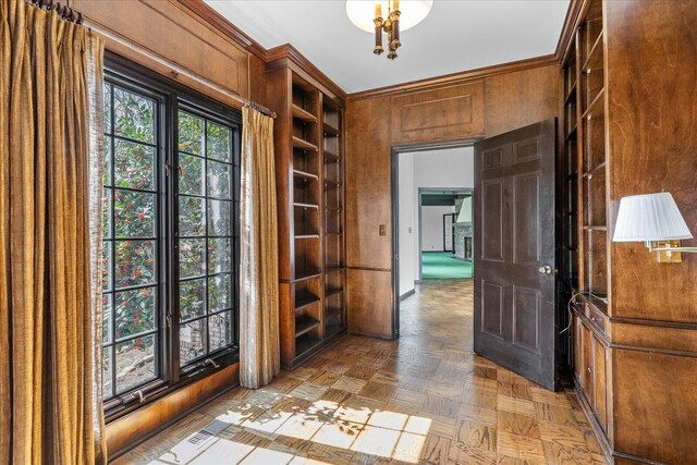 5803 Lake Resort Dr, Hixson, TN 37343 - entrance foyer with wood walls and ornamental molding