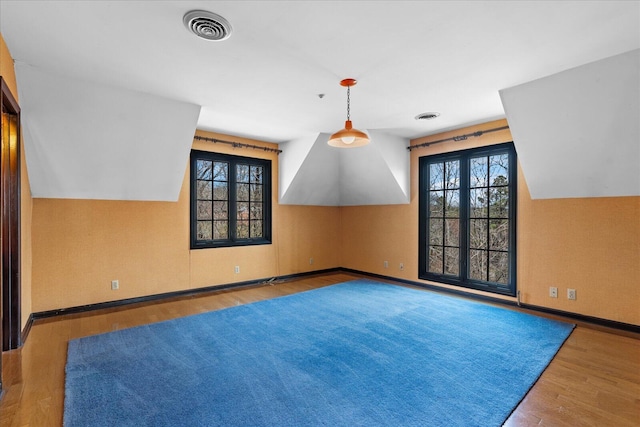 5803 Lake Resort Dr, Hixson, TN 37343 - bonus room with lofted ceiling, wood finished floors, and visible vents