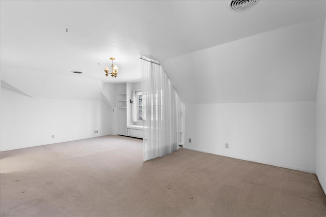 5803 Lake Resort Dr, Hixson, TN 37343 - additional living space featuring visible vents, lofted ceiling, light colored carpet, and a notable chandelier