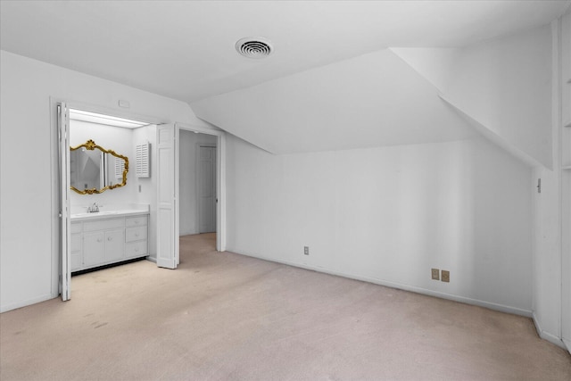 5803 Lake Resort Dr, Hixson, TN 37343 - additional living space with baseboards, visible vents, lofted ceiling, a sink, and light colored carpet