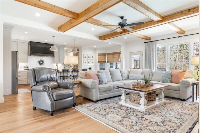 living room featuring beam ceiling, recessed lighting, light wood finished floors, and ceiling fan