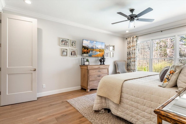 bedroom featuring crown molding, recessed lighting, light wood-style floors, and baseboards