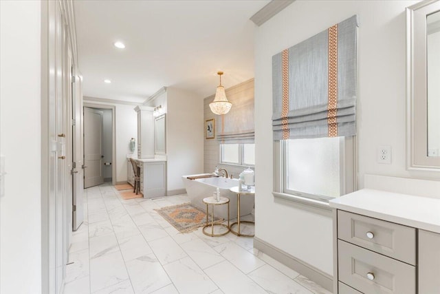 full bath with recessed lighting, baseboards, a soaking tub, and marble finish floor