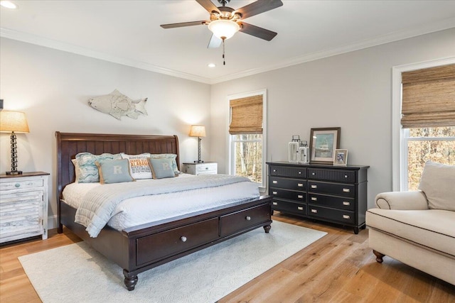 bedroom featuring recessed lighting, crown molding, ceiling fan, and wood finished floors