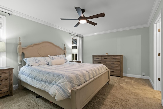 bedroom featuring ceiling fan, baseboards, carpet floors, and ornamental molding