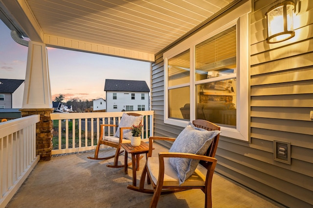 patio terrace at dusk with a porch