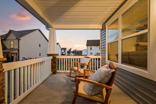 view of patio terrace at dusk