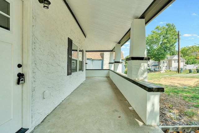 view of patio featuring a porch