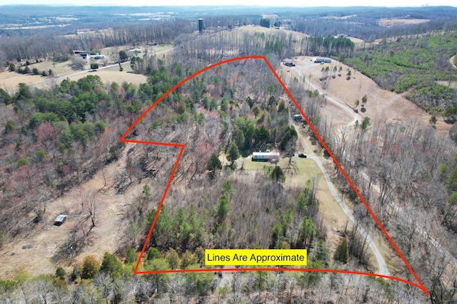 aerial view featuring a rural view and a forest view