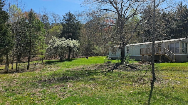 view of yard featuring stairway