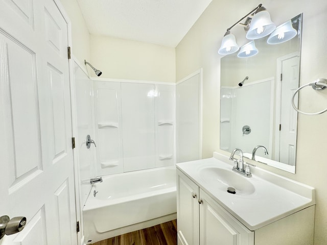 full bathroom featuring vanity, shower / bathing tub combination, and wood finished floors