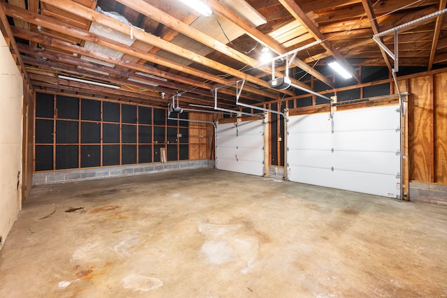 garage featuring a garage door opener