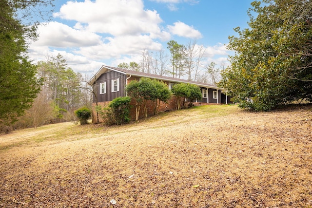 view of front of home featuring board and batten siding