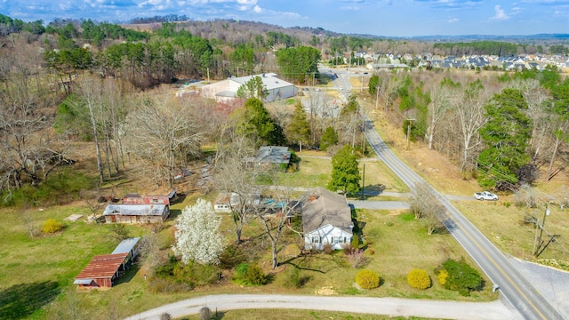 aerial view with a wooded view